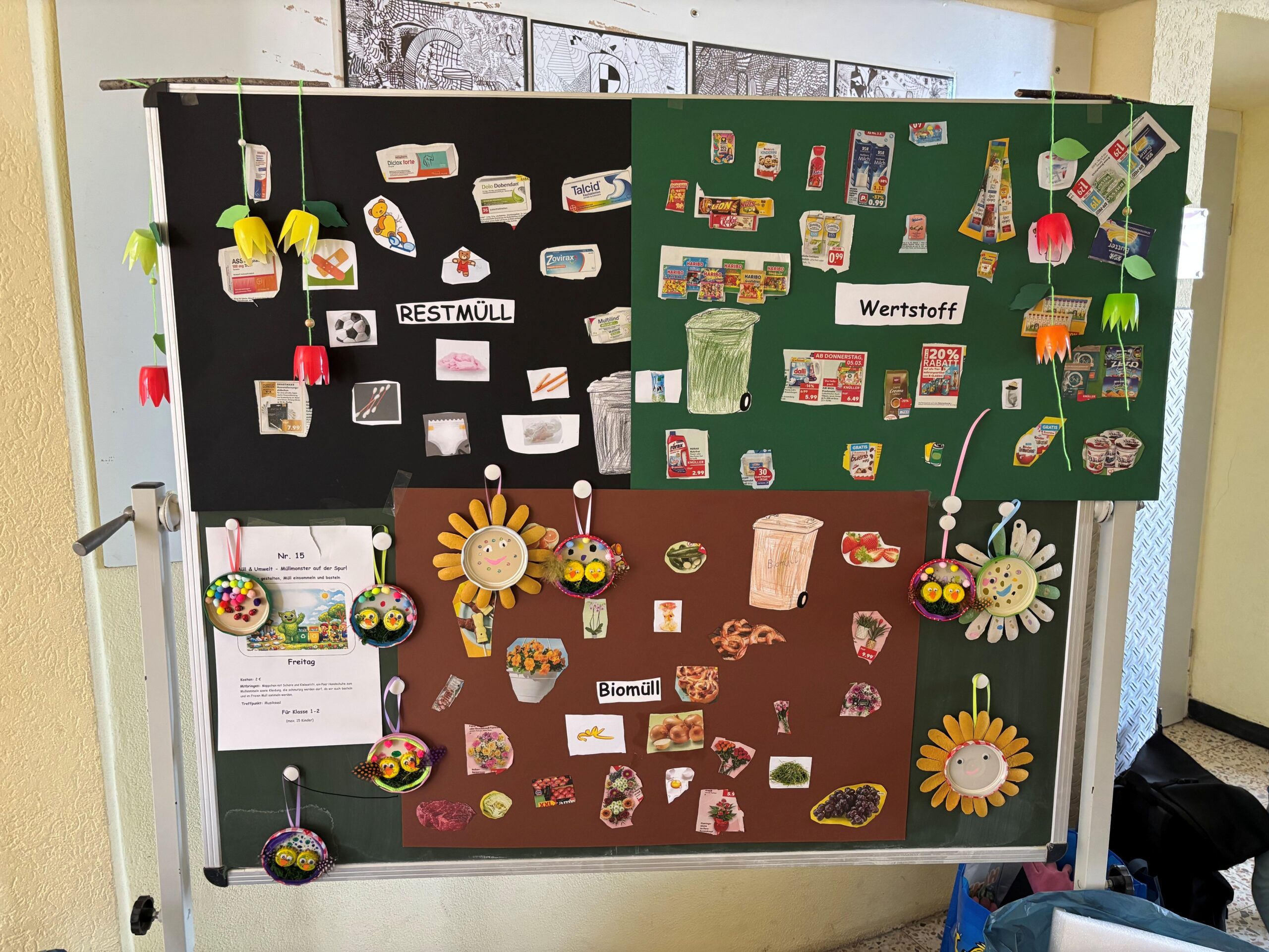 Kinder beim Projekt Müllmonster mit Sammelbehältern